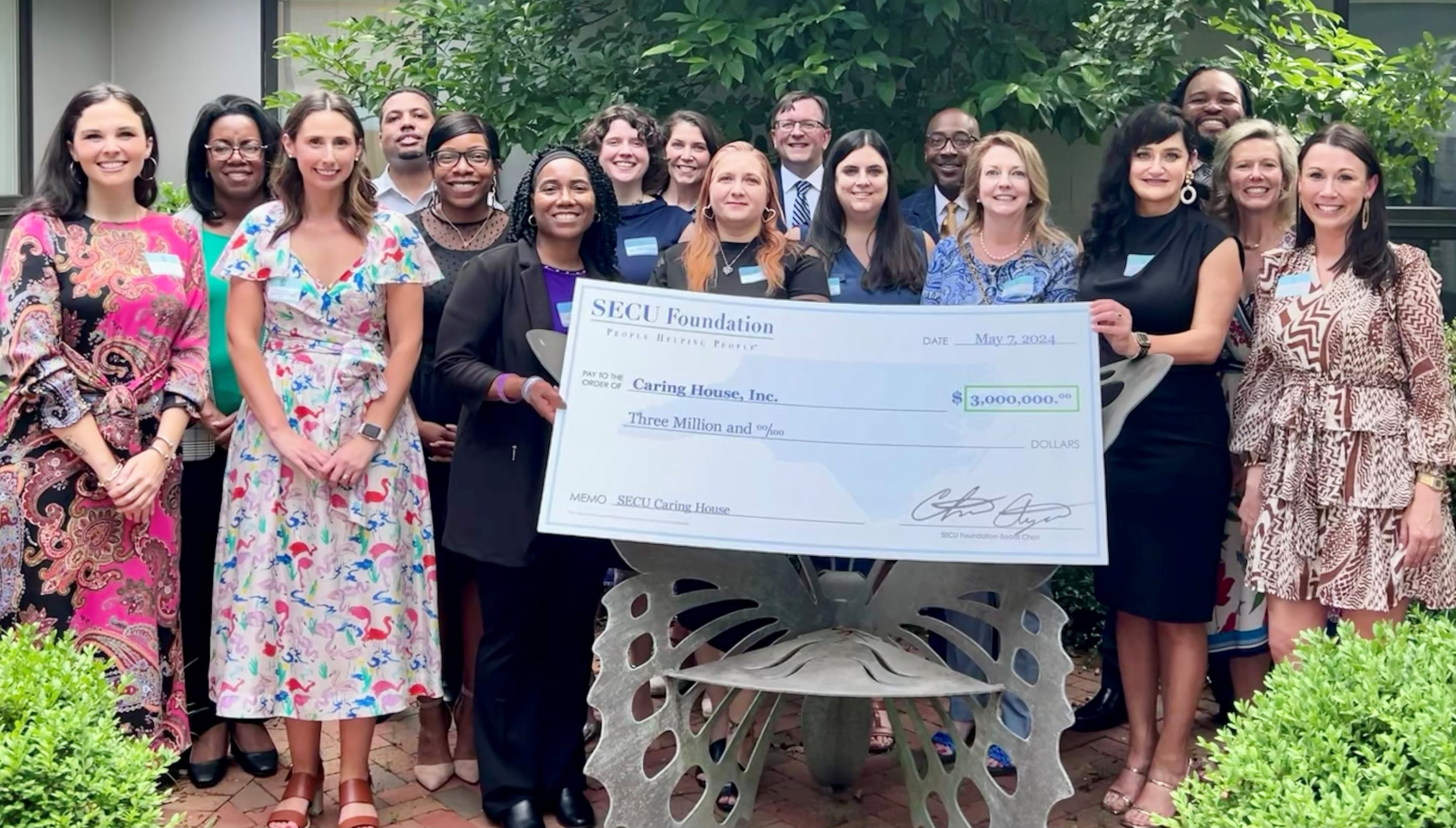 SECU Foundation Board Members, staff, and SECU representatives with Caring House leaders during check presentation.