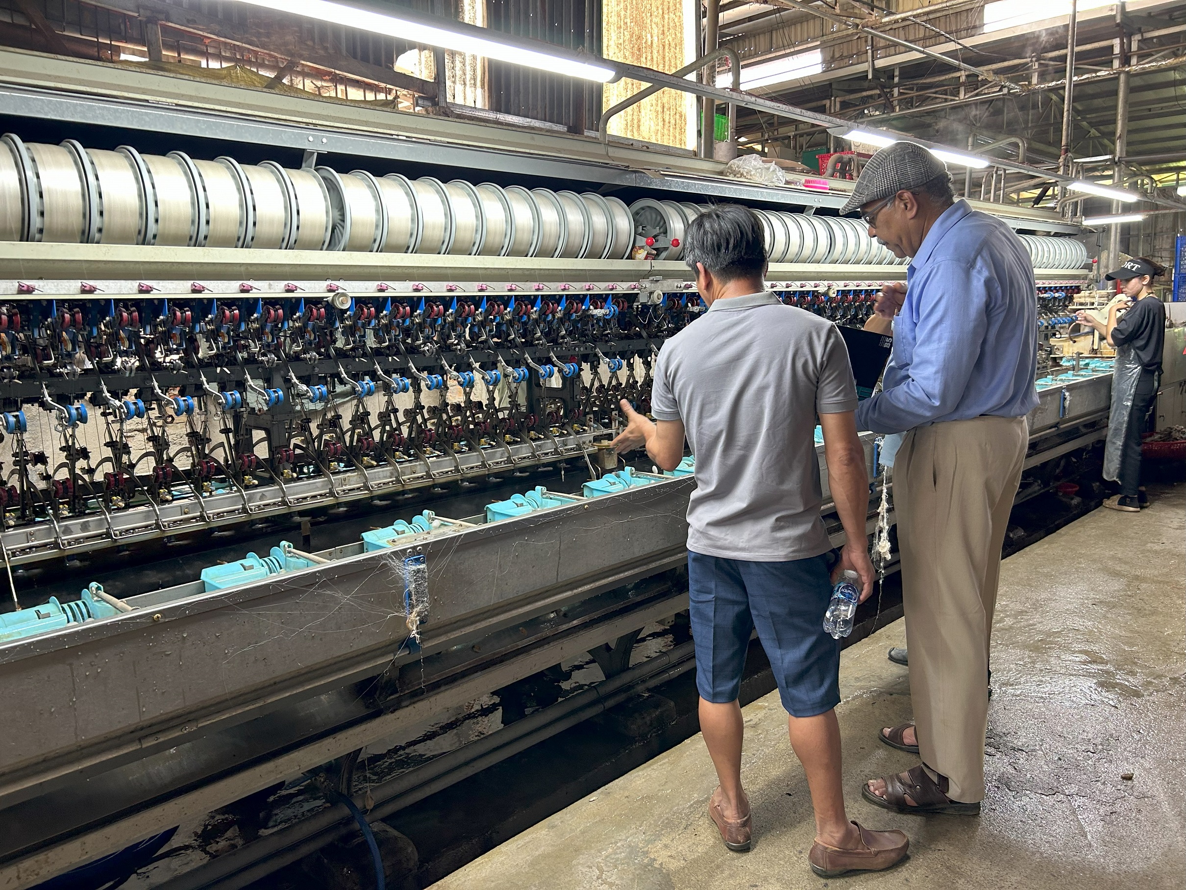 Dr. Nirmal Kumar Assessing Automatic Silk Reeling Facilities.jpg