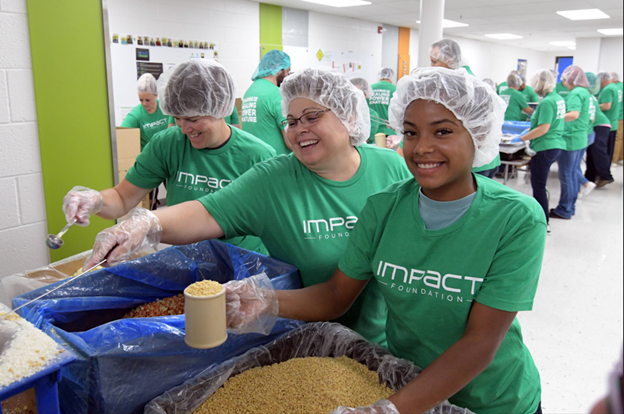 Nature’s Sunshine’s Impact Foundation participating in local food drive.