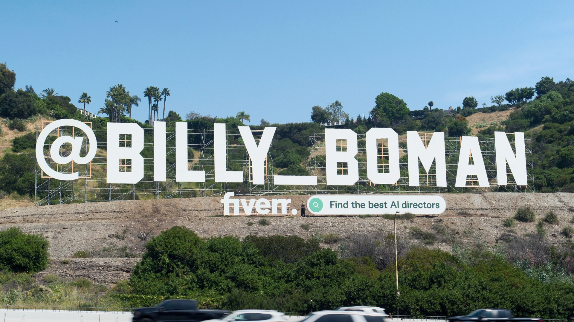 Fiverr 's New Billy Boman installation over the 101 freeway in Los Angeles 