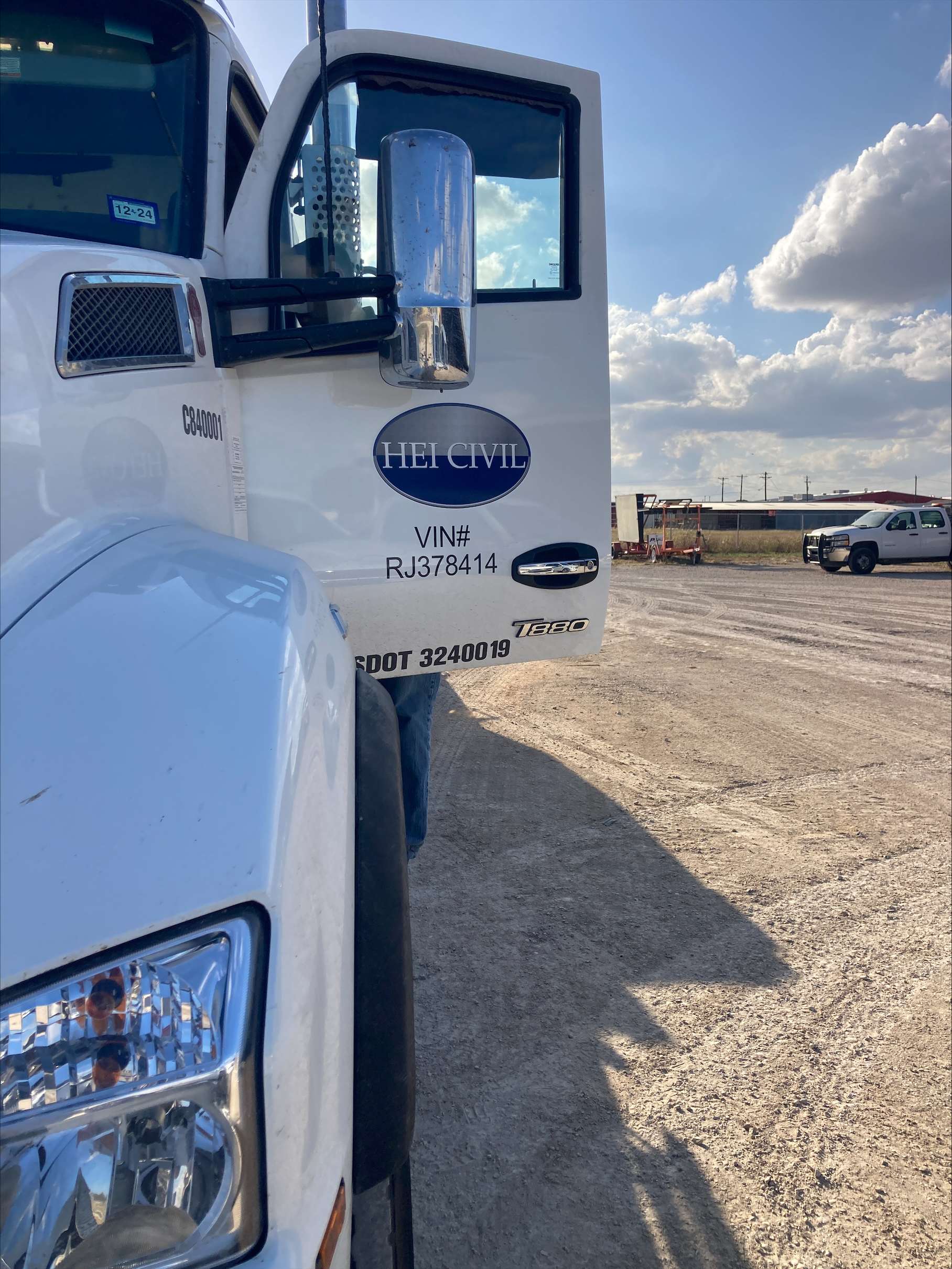 HEI Civil logo on a previous Peabody General Contractors Transport Truck in Austin, Texas