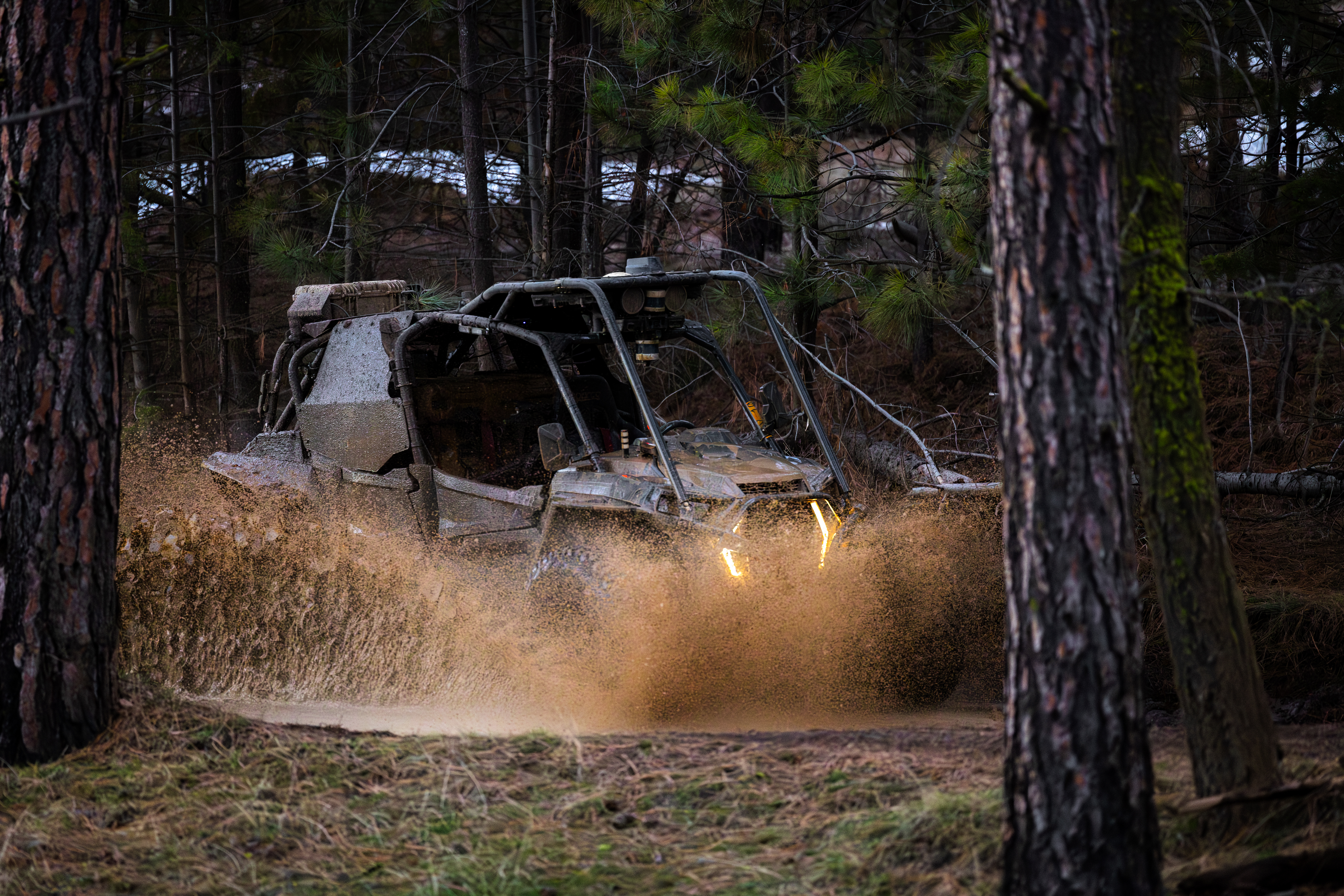 Overland AI's OverDrive autonomy stack is resilient to adverse surface conditions including mud, ice, sand, brush.