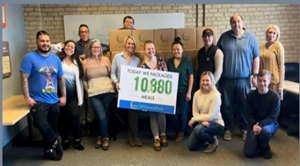 Team members from Cities Management volunteered with Harvest Pack food bank and packed 10,880 meals that will be distributed to local food pantries.