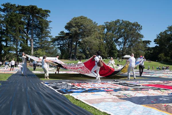 Ceremonial Unfolding of the Quilt at Historic Display