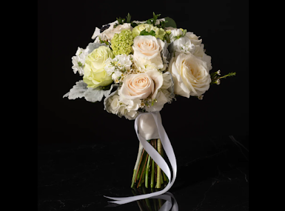 Capitol Hill florist Tamika Harris shares elopement bouquet tips for photo ops in Civic Center Park on the Denver Flower Shop Podcast.