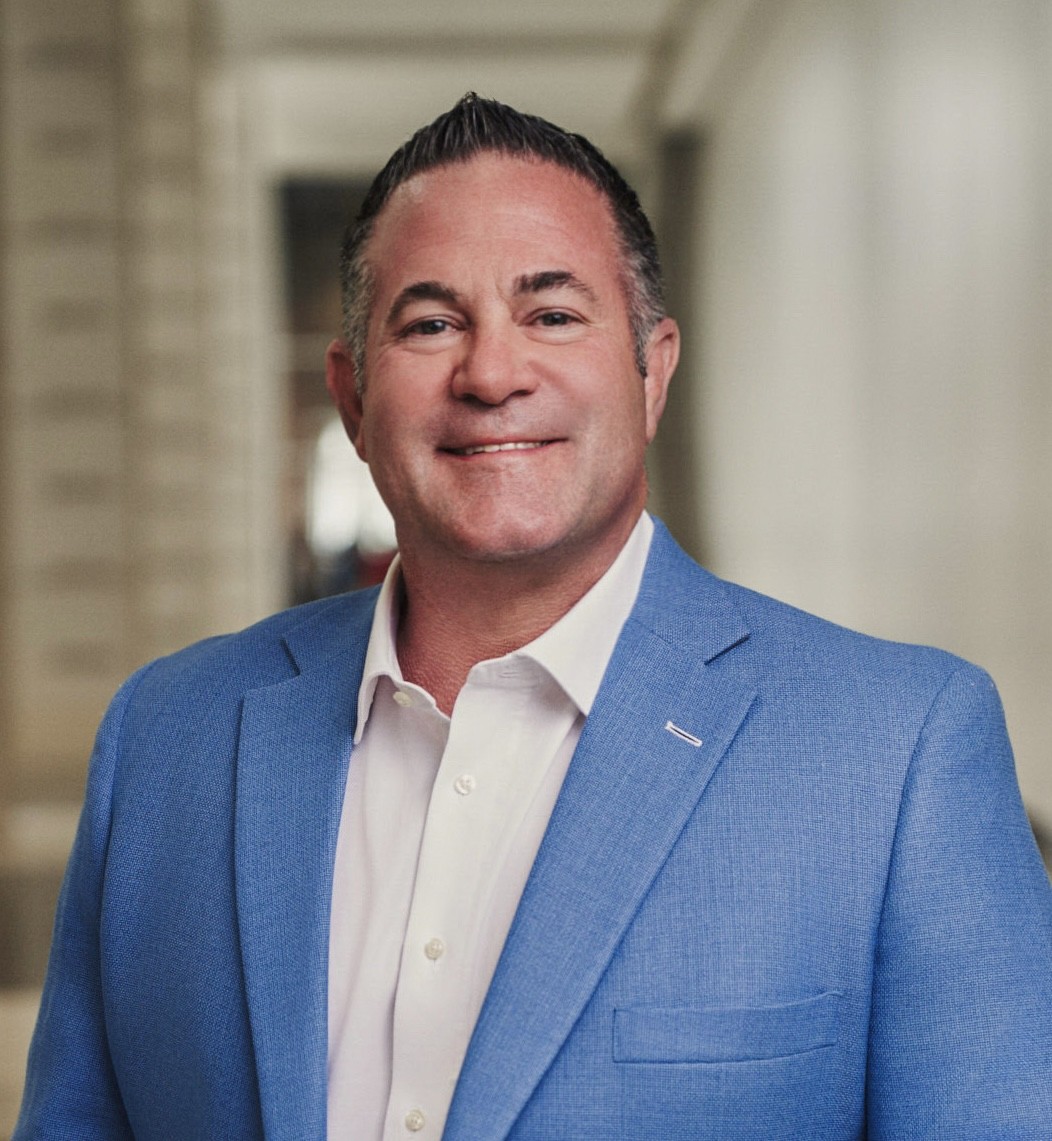 Grant Cooper in a blue sport coat