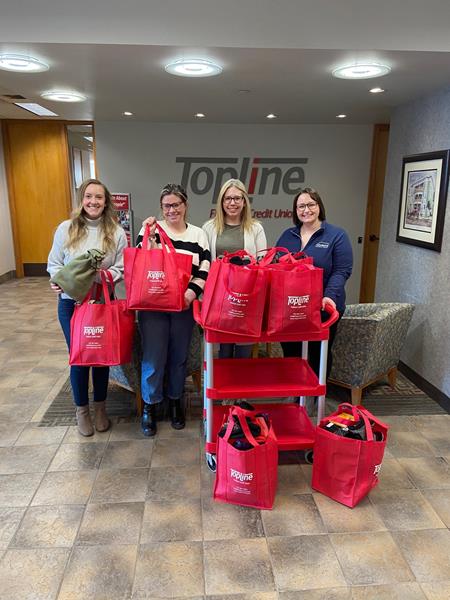 TopLine and Keystone with winter gear drive donations