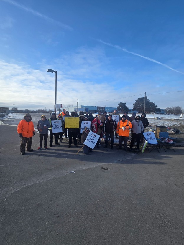 Members of USW Local 3505 stand on the picket line outside Slacan Industries in Brantford, Ont.