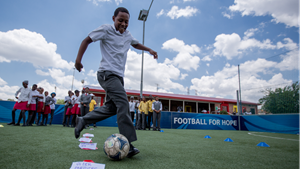 Adolescents in South Africa participating in Grassroot Soccer's sports-based health programs.