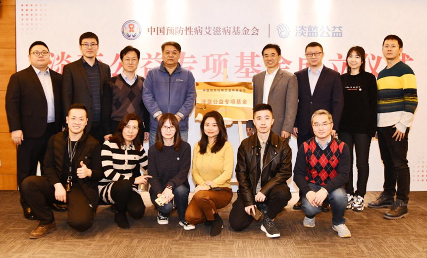 Attendees of the meeting posed for photographs