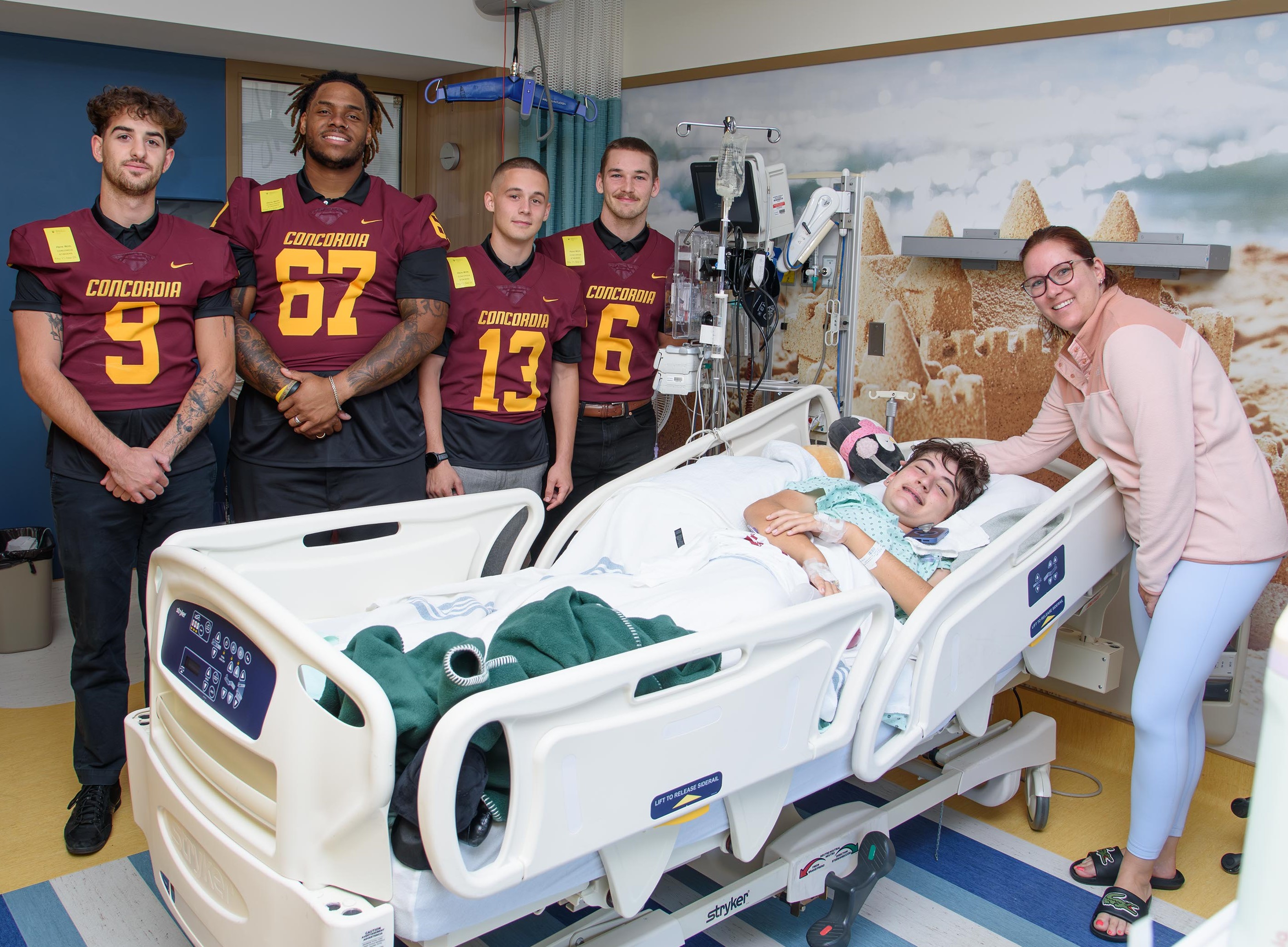 Our patient James enjoying conversations and fun moments with the Stingers players during their visit