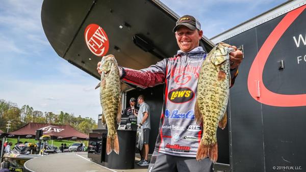Pro Andrew Upshaw of Tulsa, Oklahoma, caught a five-bass limit weighing 18 pounds, 6 ounces to lead the field after day one of the FLW Tour at the Cherokee Lake presented by Lowrance.
