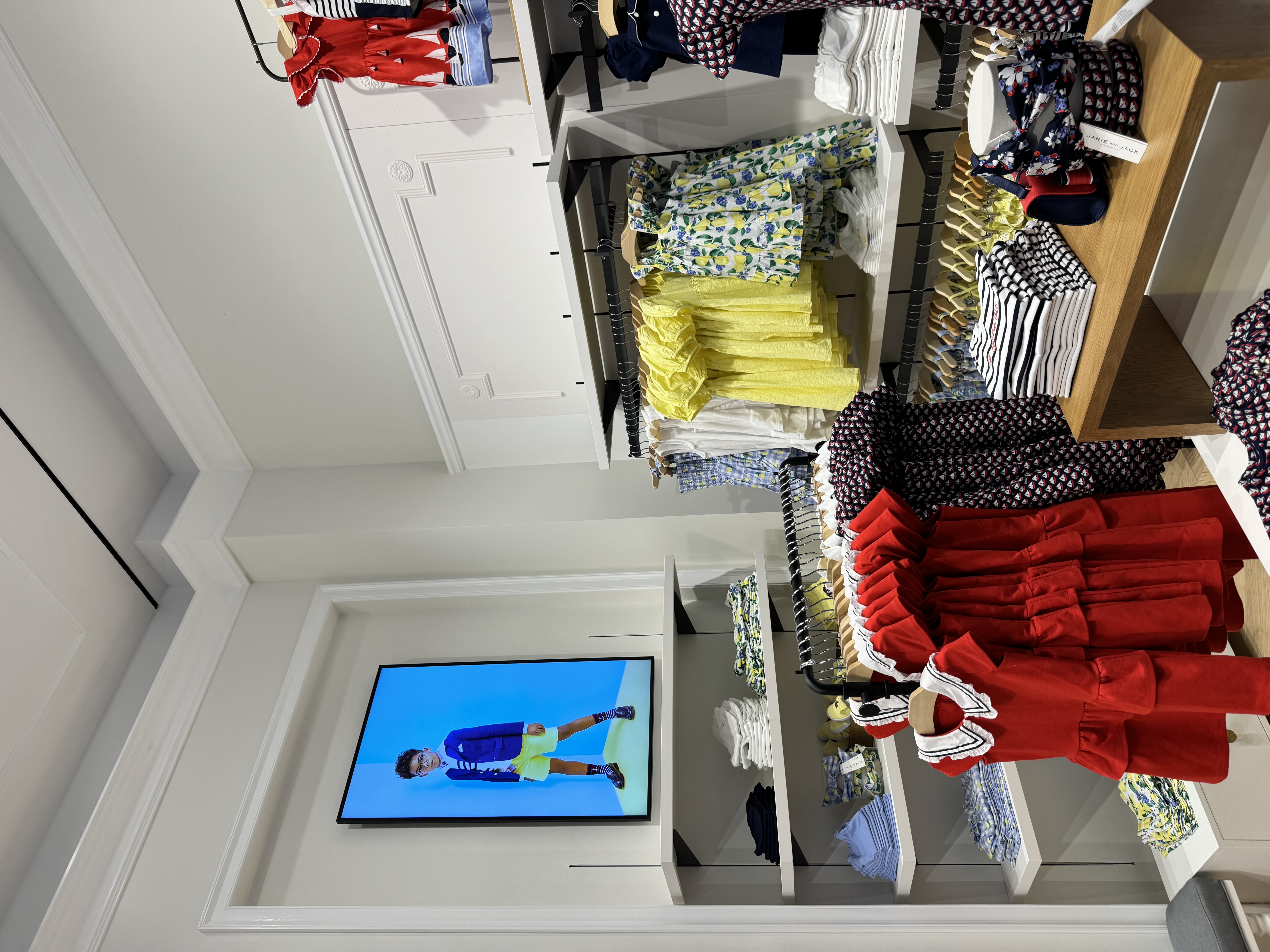 Samsung 4K display at Janie and Jack flagship showing campaign content