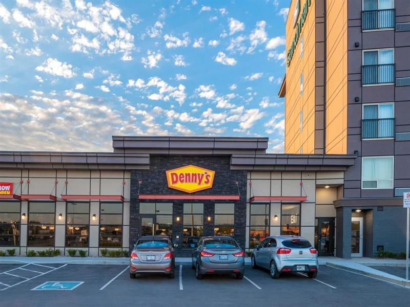 Storefront of Denny’s restaurant and car park