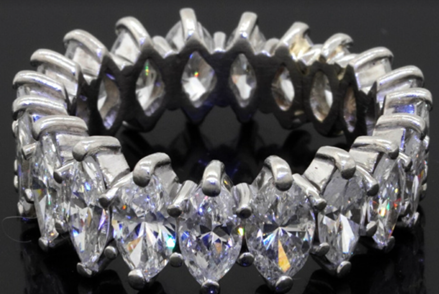 Platinum 7.50ct VS diamond eternity band ring. Sold for $6,800