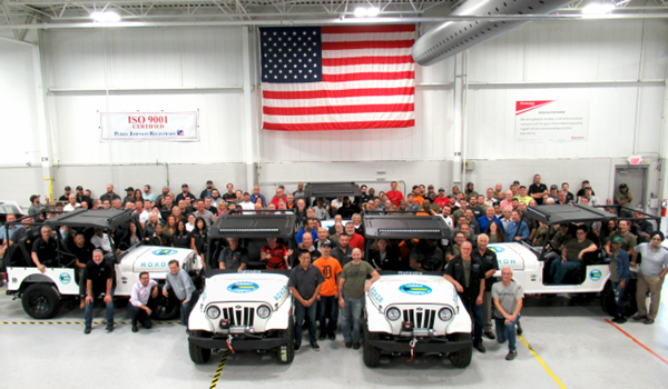 Mahindra Automotive North America employees pictured with the five ROXORs being sent to the Bahamas to aid in the Hurricane Dorian relief effort.