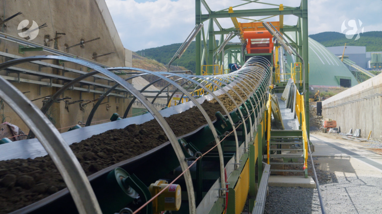 Crushed ore conveyed from the primary crusher to the coarse ore stockpile