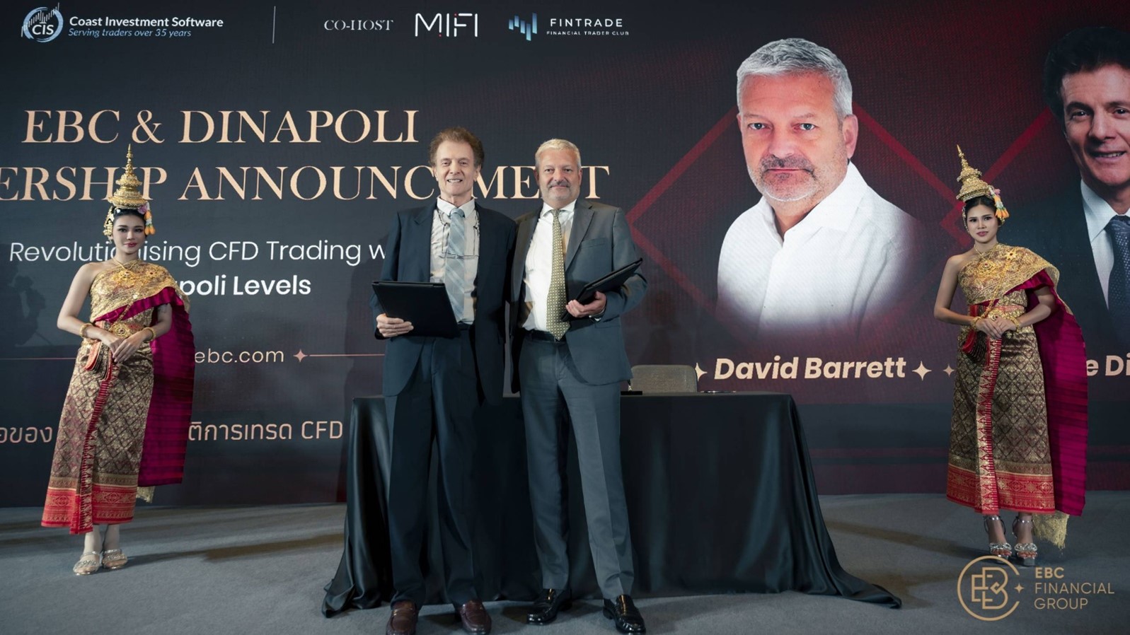 Signing and photo ceremony between Joe DiNapoli and David Barrett during EBC & DiNapoli Partnership Announcement