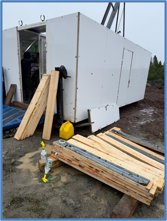 Figure 1 - Drill Rig in Operation at Pocologan 