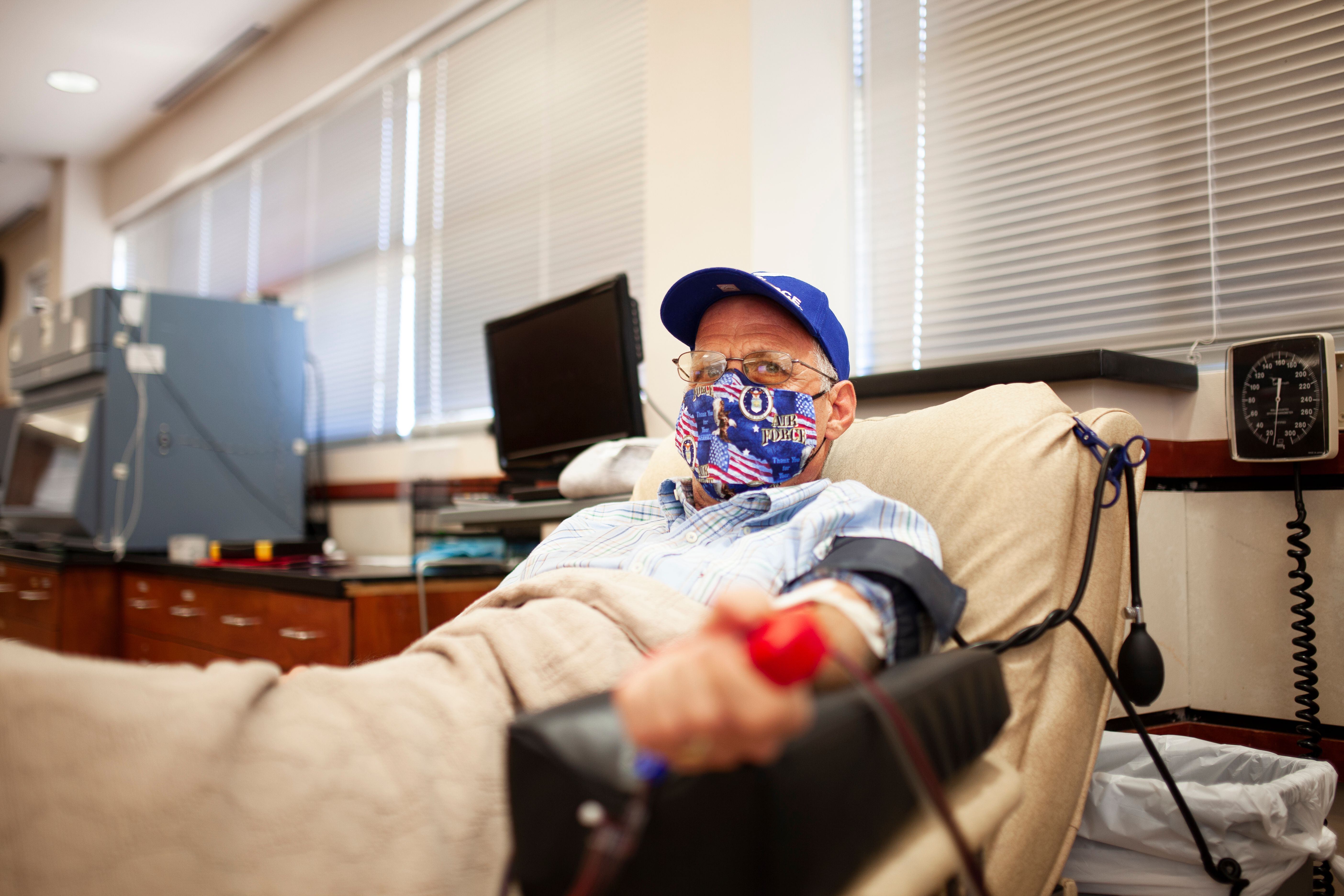 Marcos Perez makes a platelets donation on Thursday, March 18, following the event recognizing three 'all-star' blood donors with the South Texas Blood & Tissue Center. Perez was recognized for donating 120 gallons of blood and platelets, while Ron White was honored for giving 131 gallons and Gerald Perkins was recognized for giving 121 gallons.