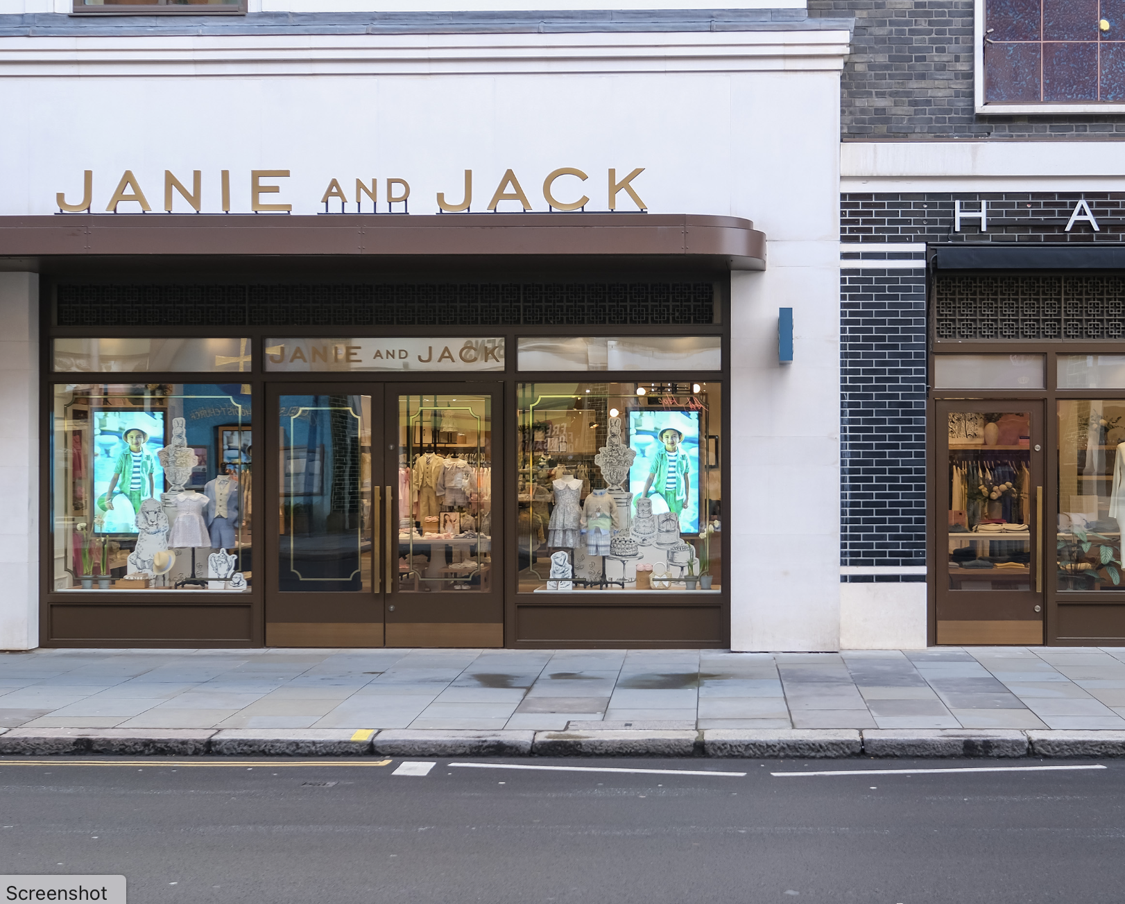 Janie and Jack London storefront with Samsung 4K window displays