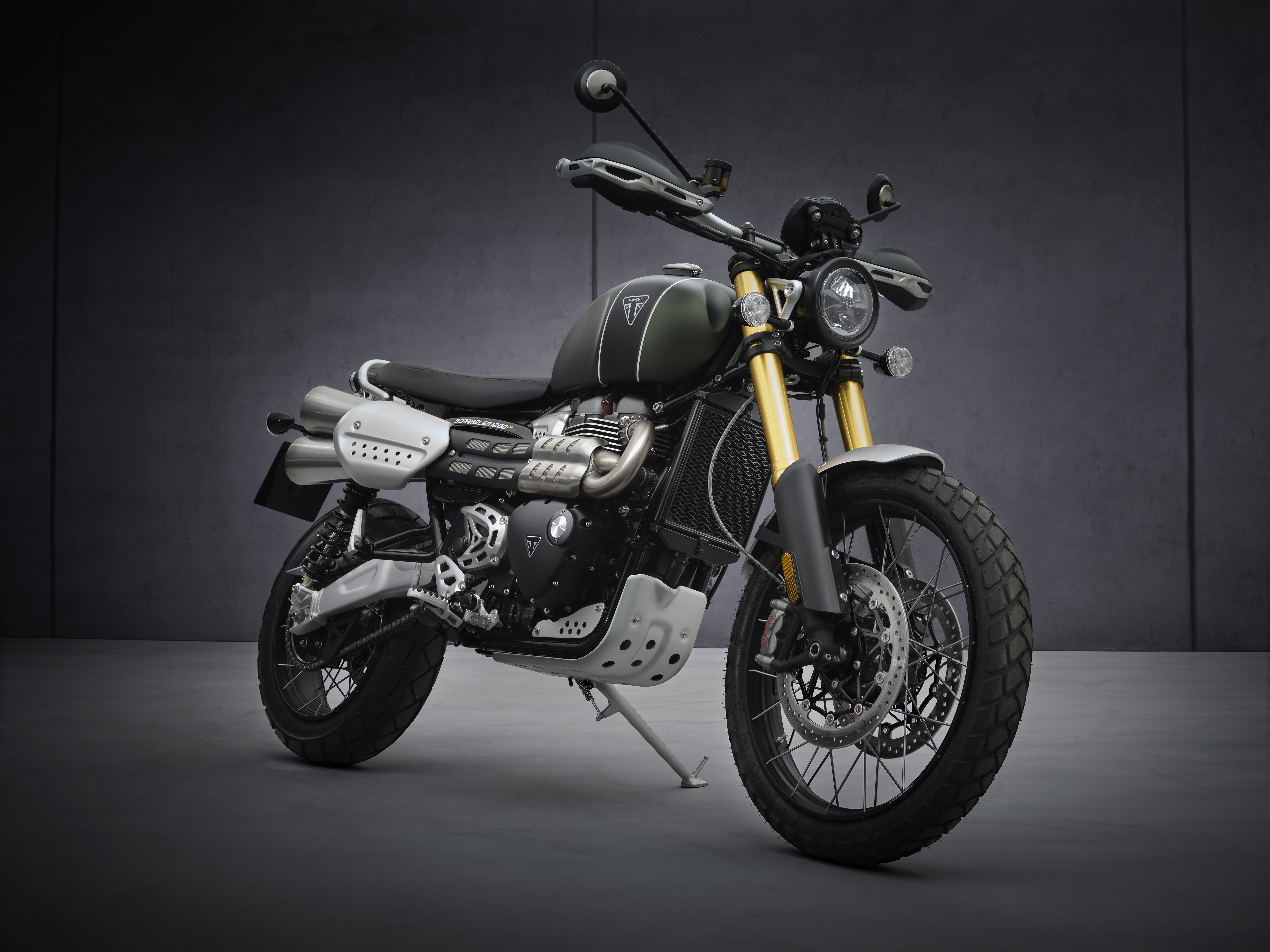 ALL OF THE SCRAMBLER 1200’S CLASS LEADING CAPABILITY.

The 2022 Scrambler 1200 XE and XC represent the latest generation of one of the most capable and unique motorcycles on the market, and one of Triumph’s highest specification models ever. A genuine, class-defining cross over of two motorcycle worlds, with the iconic style and character of a Triumph Modern Classic, combined with the capability and specification of a full-on adventure motorcycle.
