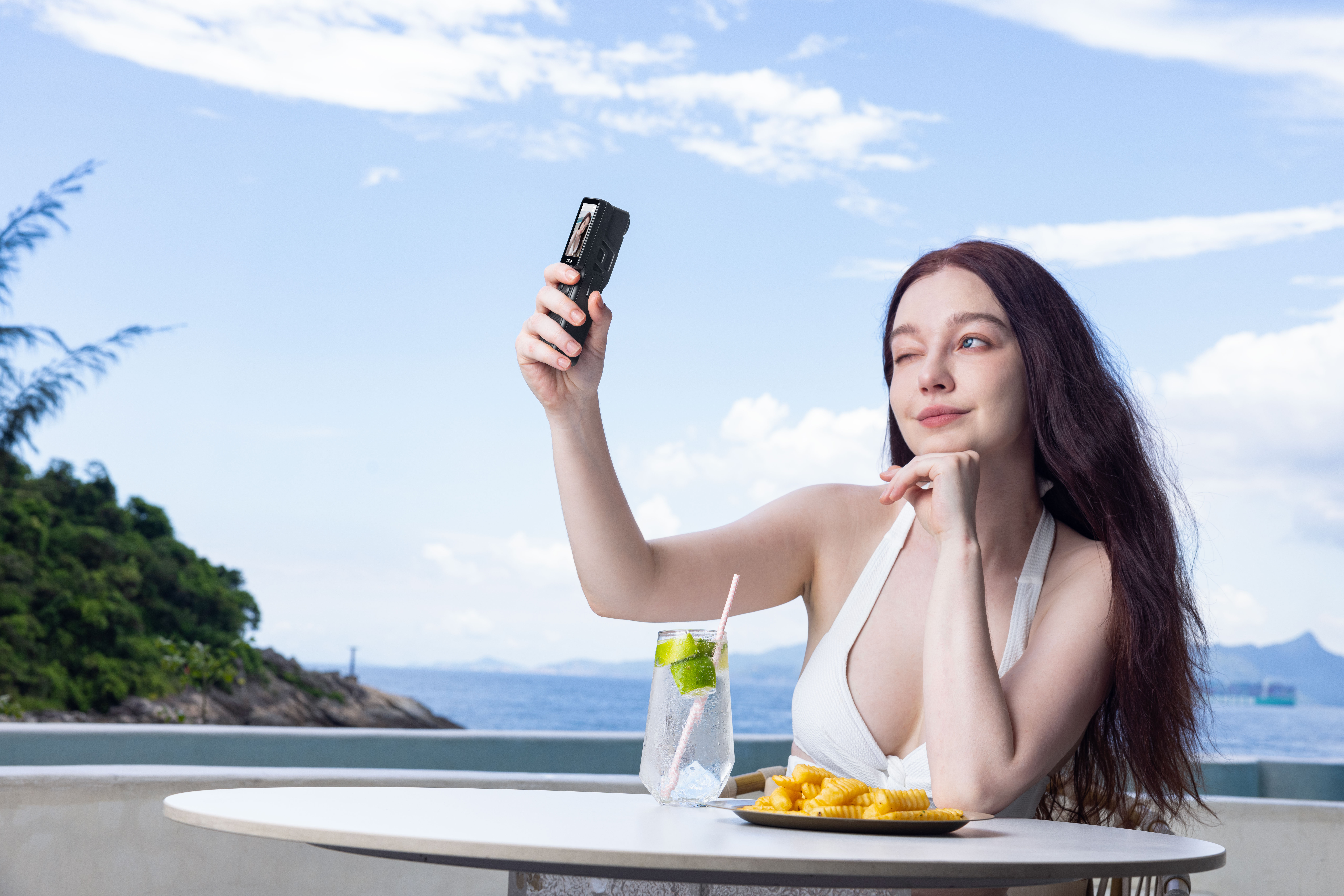 A woman using an SJCAM C400 4K Action Camera