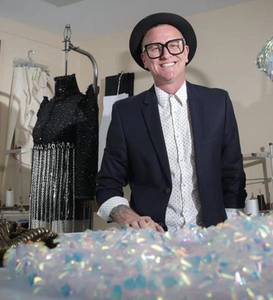 Seth Aaron Henderson, two-time Project Runway winner and new Lead Designer at FIN FUN, prepares to debut his beach and resort wear collection for Spring 2020