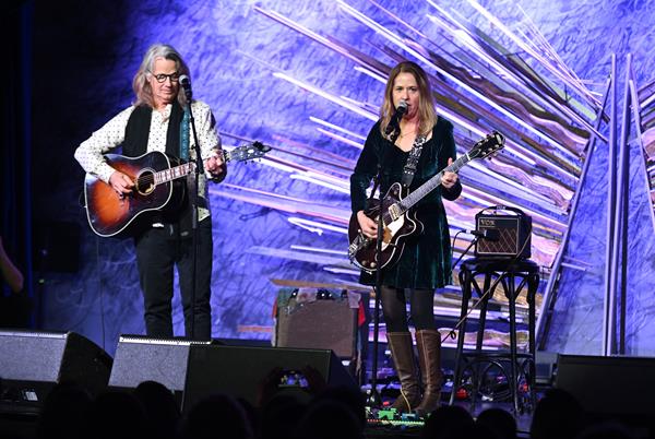 Vicki Peterson and John Cowsill perform at Musicians On Call's Hope for the Holidays concert for caregivers