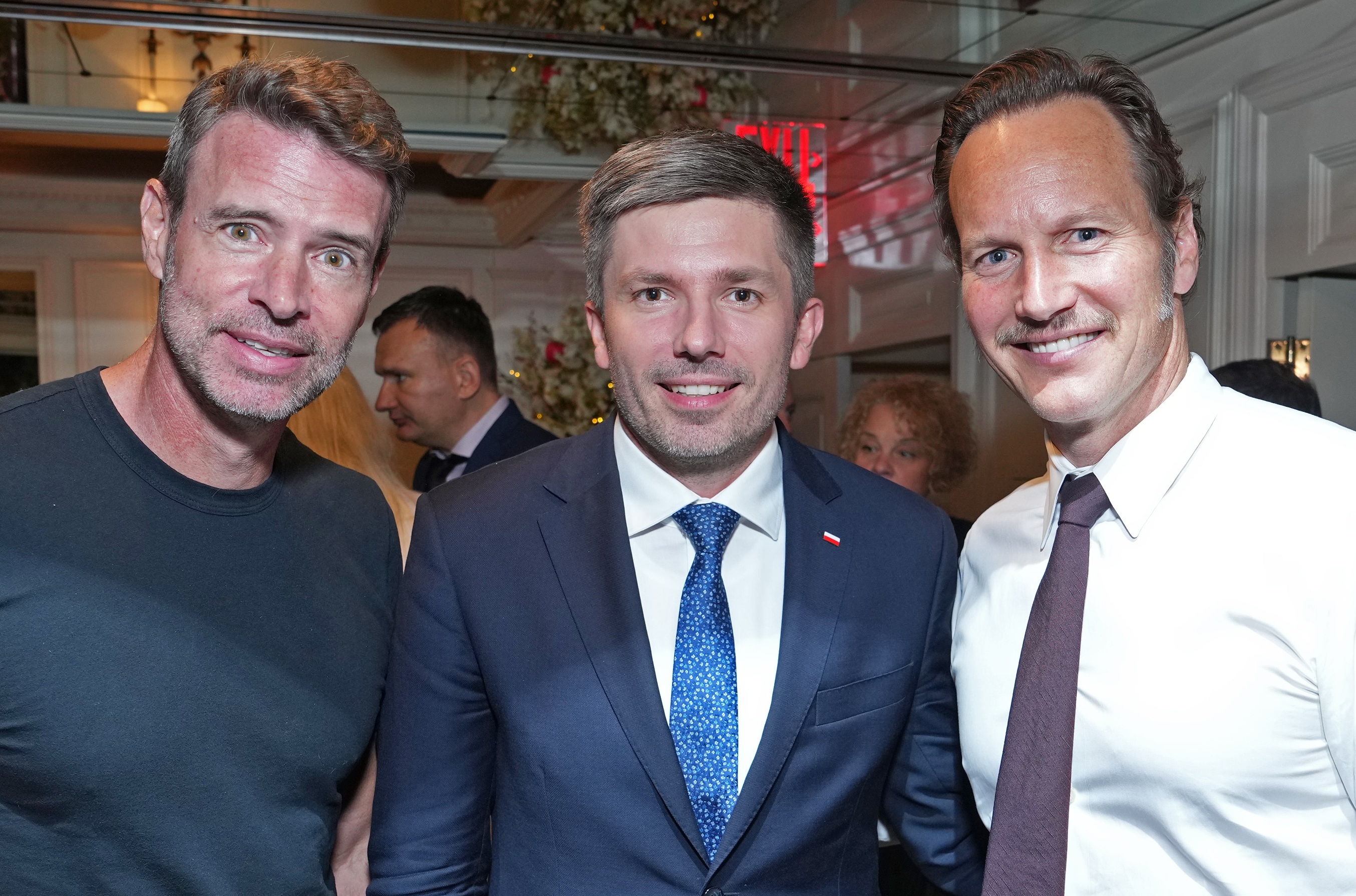 Actors Scott Foley and Patrick Wilson with Adrian Kubicki, Consul General of the Republic of Poland in New York enjoying the Jabłonki celebration hosted by the State of Poland Foundation at The Carlyle Hotel in New York City. Image taken on Monday, September 18, 2023 in New York. (Bennett Raglin/AP Images for State of Poland Foundation)