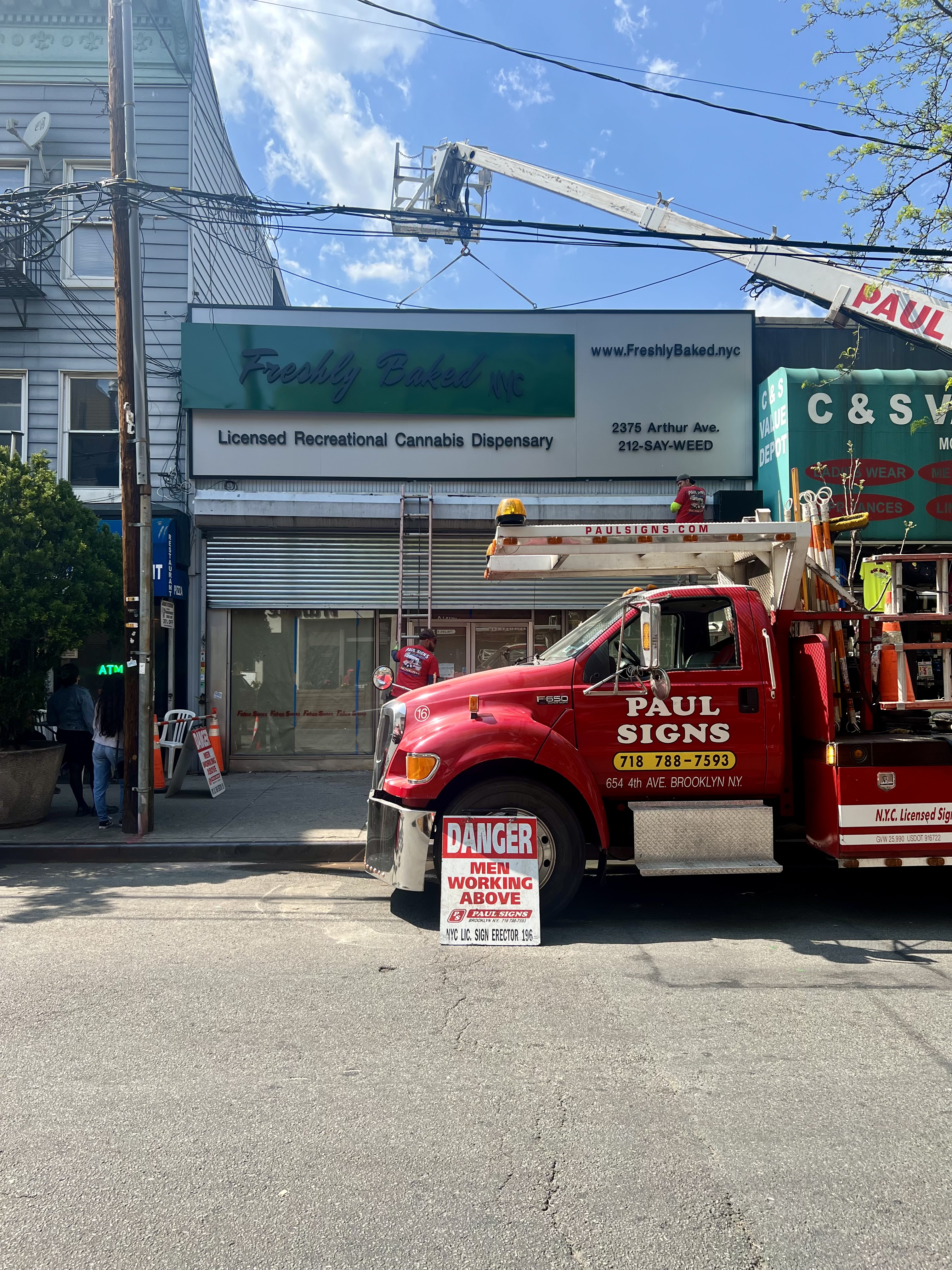 Crane Installs Freshly Baked NYC Sign