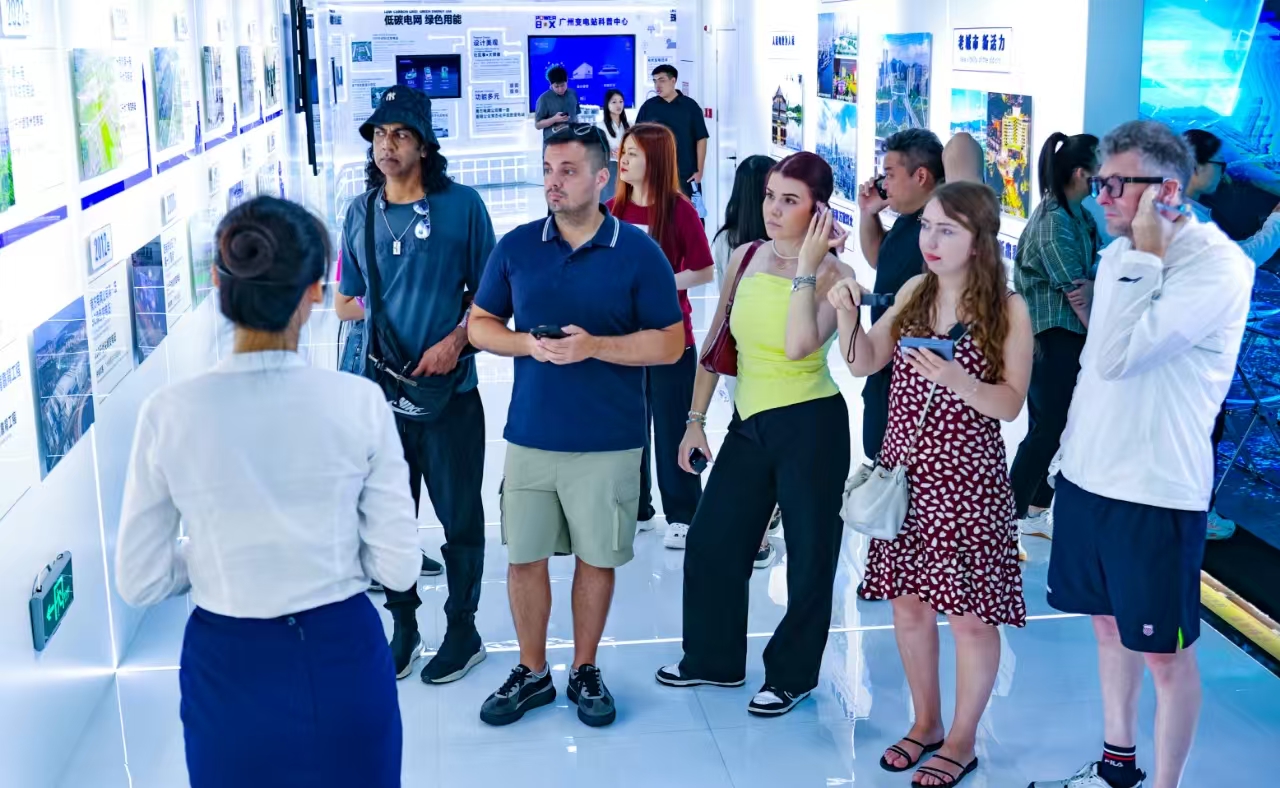 Visitors touring the exhibition hall"