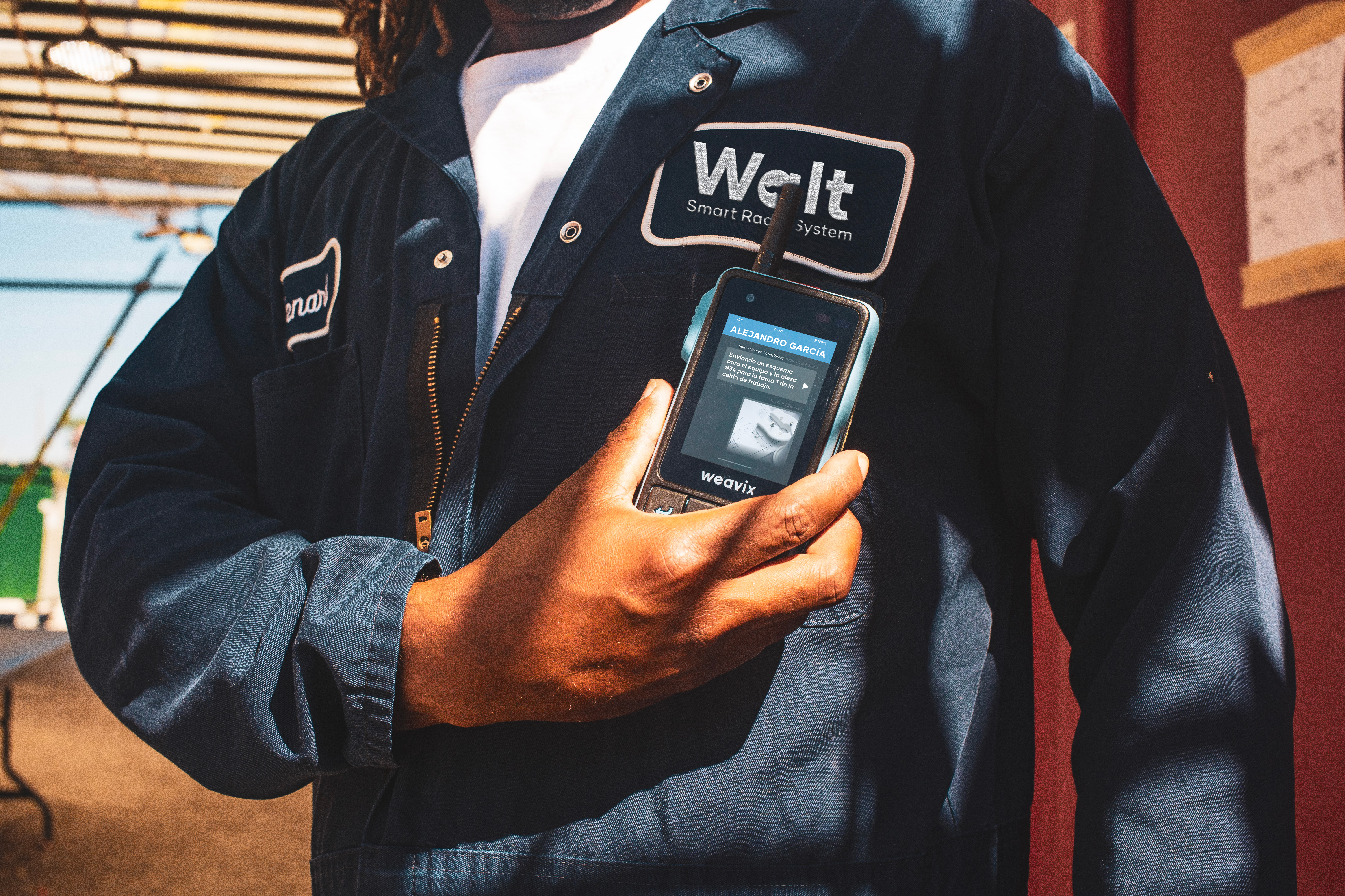 Walt Smart Radio by weavix - worker holding against chest