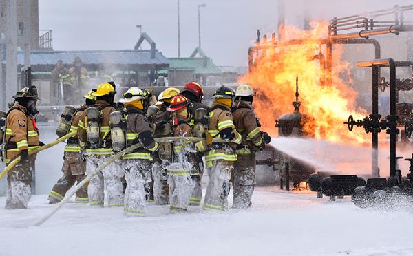 Firefighters gain experience extinguishing a Bulk Storage fire at Brayton Fire Training Field in College Station, Texas. Valero funded training for 60 municipal and volunteer firefighters to learn the proper techniques for extinguishing ethanol fires. 