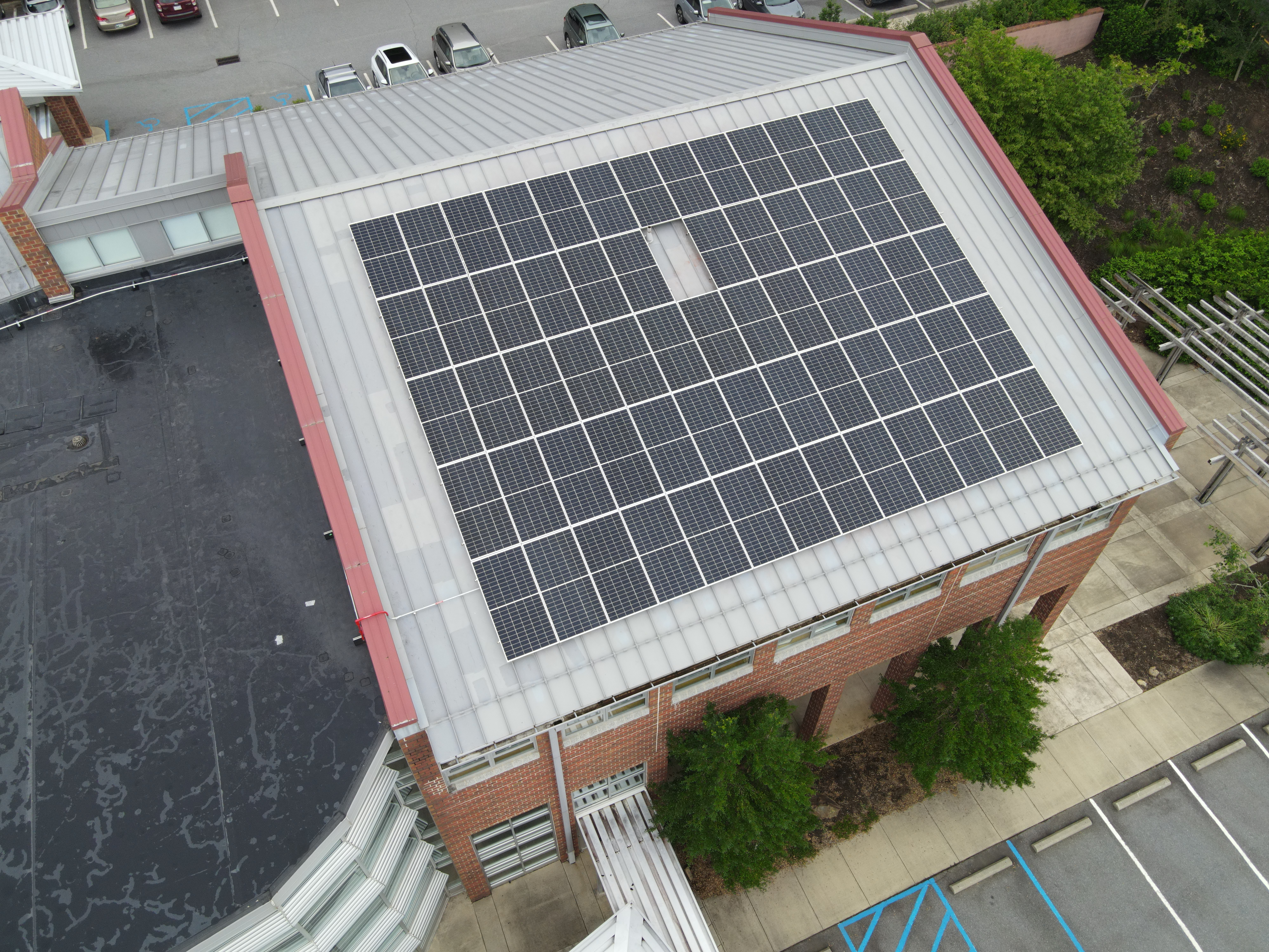 The 64-panel solar array will provide 37,000 kWh annually for UNC Asheville Reuter Center