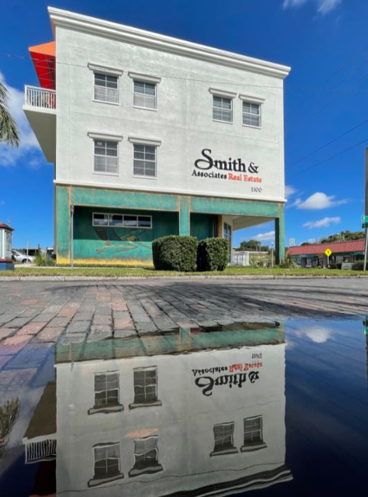 Smith & Associates Real Estate Commissioned local artist, Derek Donnelly, to adorn their Fourth Street office