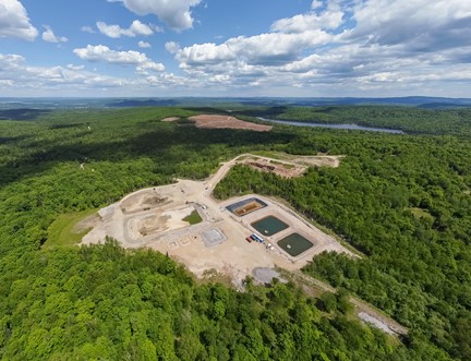 Aerial view of Nouveau Monde’s demonstration site at the forefront and the zone for the Matawinie mine industrial platform at the back, now ready for the start of civil works.