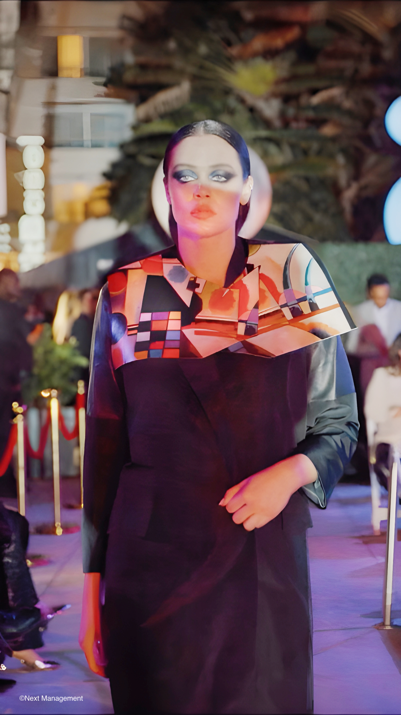 Jayne Pierson's “Kandinsky Coat” applied a digital art printing technology to fashion for the first time at a show Dec. 7 at the Sagamore Hotel during Art Basel Miami. Pierson captured and integrated elements of Wassily Kandinsky’s 1925 painting “Swinging” printed on premium leather. The abstract art piece conveys a sense of freedom from the real world that aligns with the magical Welsh themes of the other looks shown.