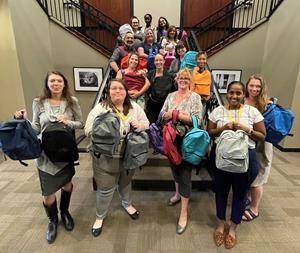 Team members from Associa Real Property Management recently volunteered with local non-profit group One Dublin to help provide area students with school supplies and other necessities.
