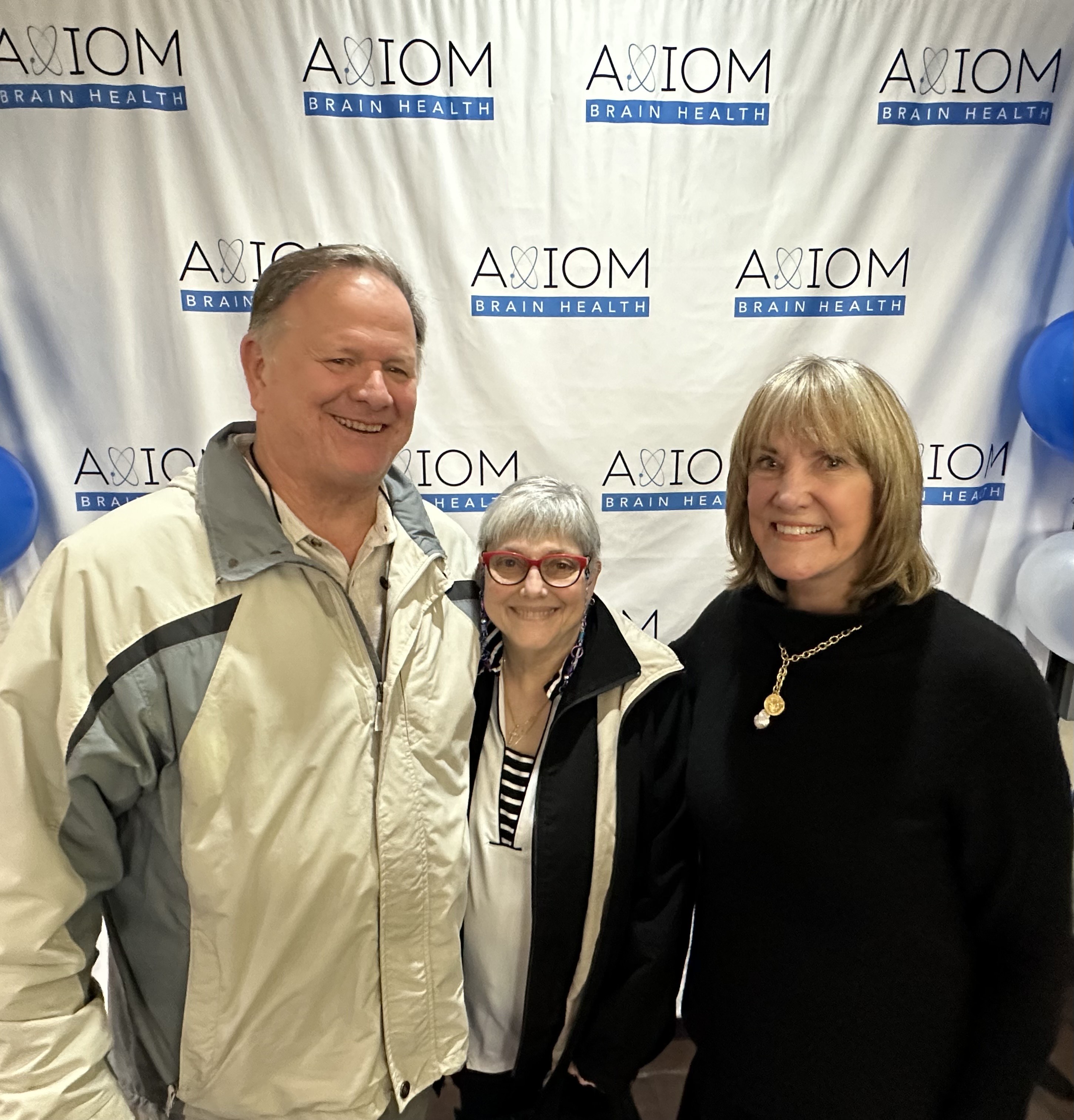 Citizen Scientist Richard Cacciatore and his wife Becky Cacciatore who volunteer at Axiom Brain Health celebrated with Dr. Susan Steen at the Axiom Brain Health ribbon cutting.