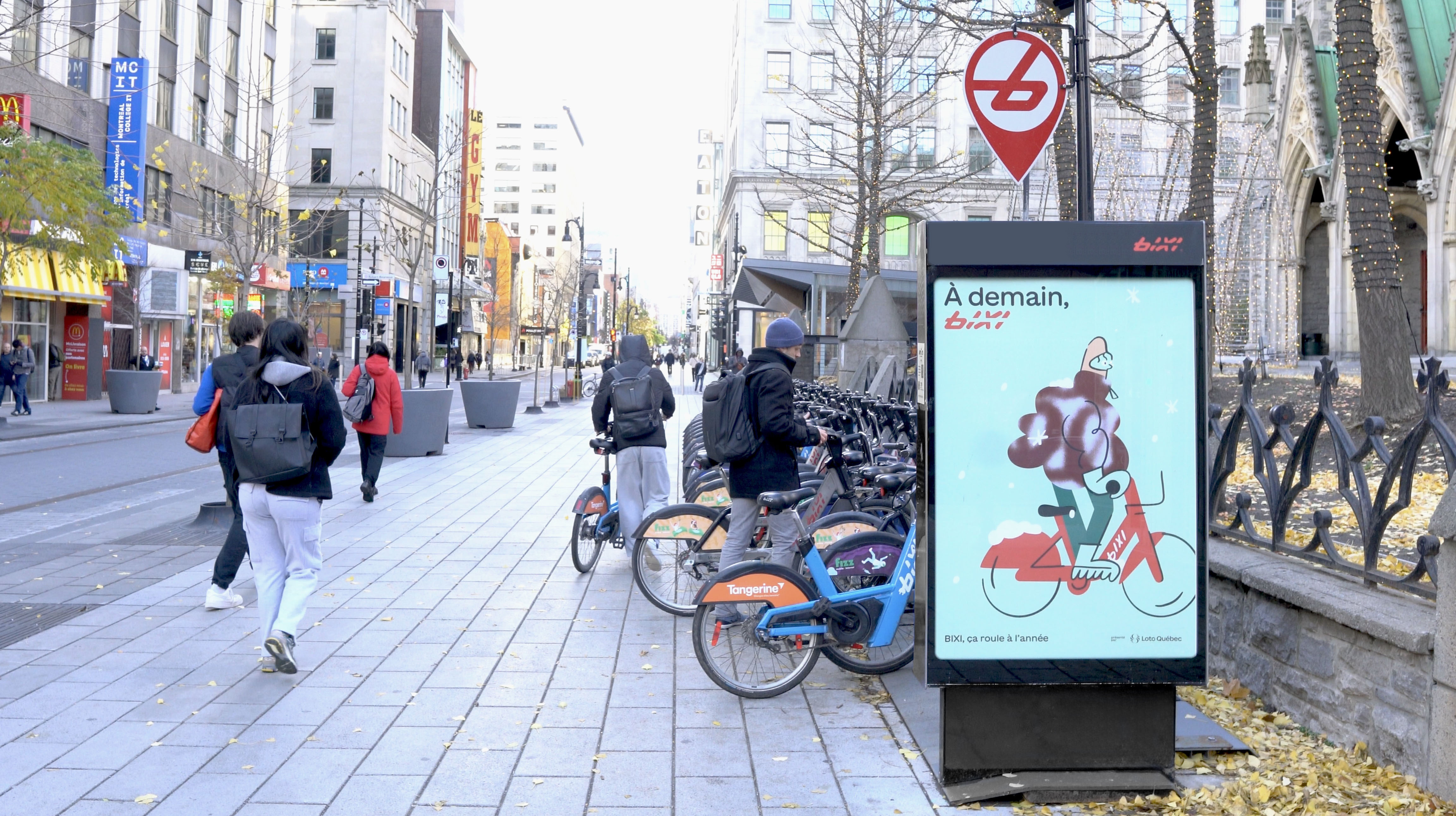 BIXI bike-share station in Montreal, with PATTISON’s street-level static poster