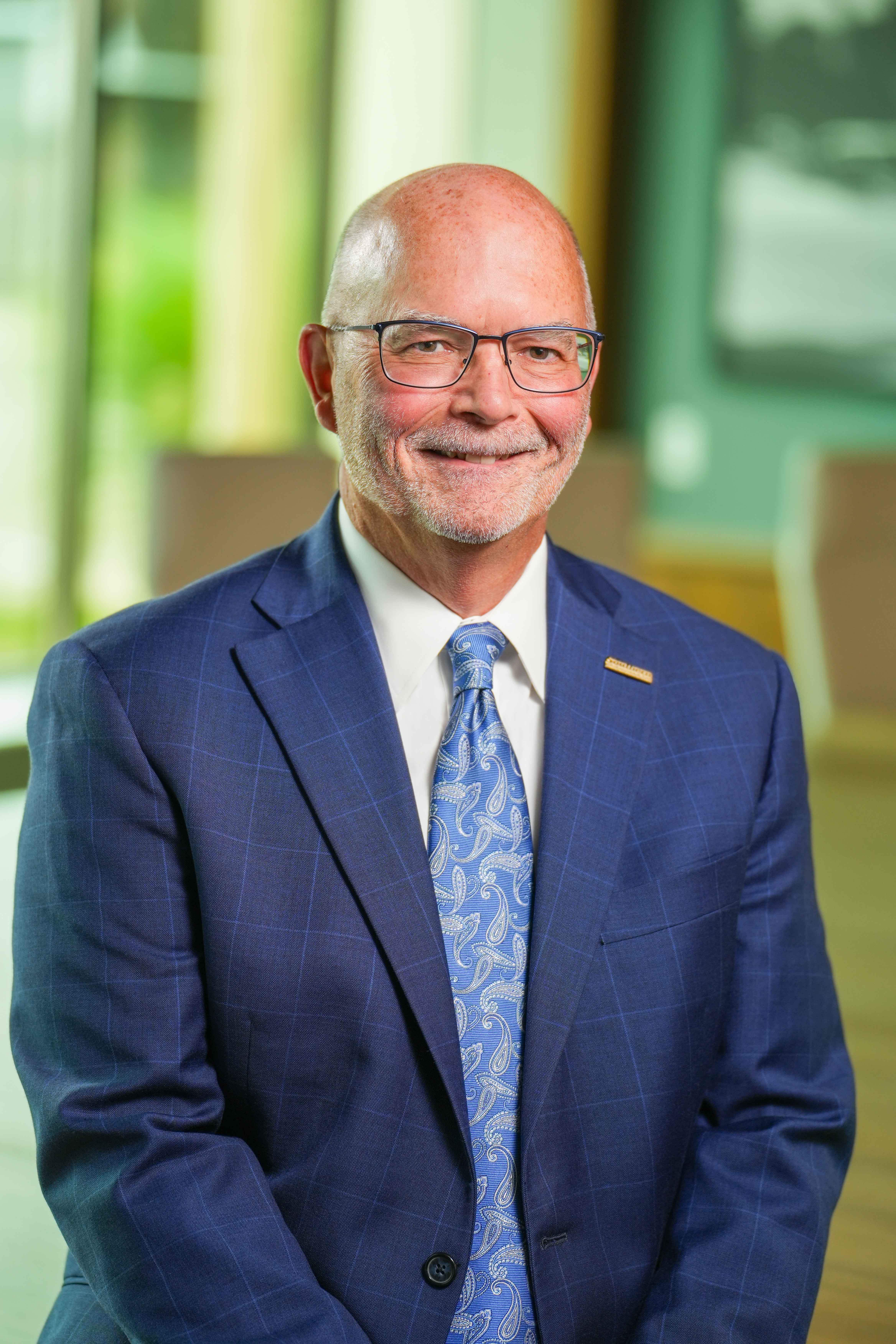 John Castle, Former Chairman & CEO