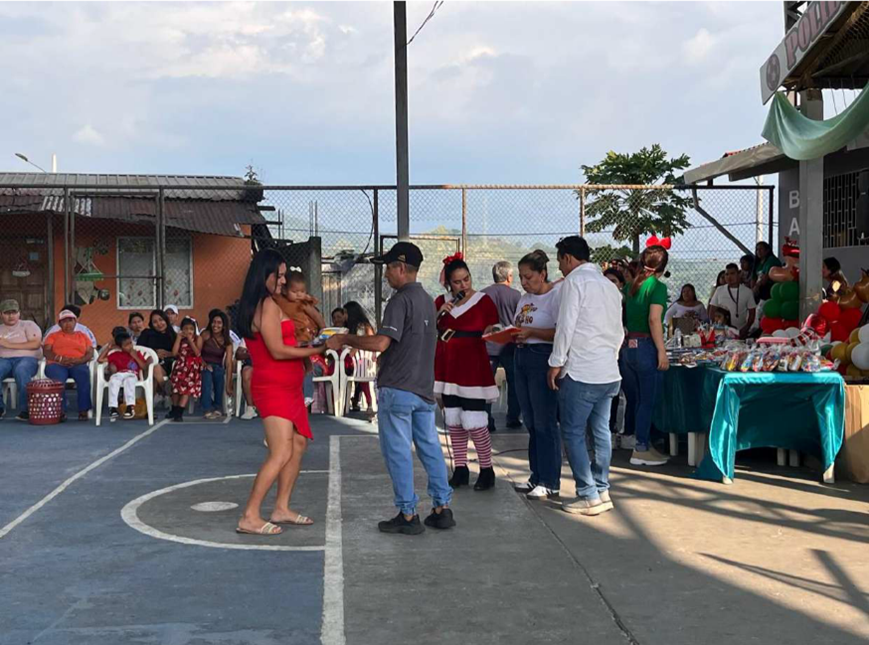 Figure 2: Donation of Christmas baskets to families from Svetlana communities in Ecuador. image