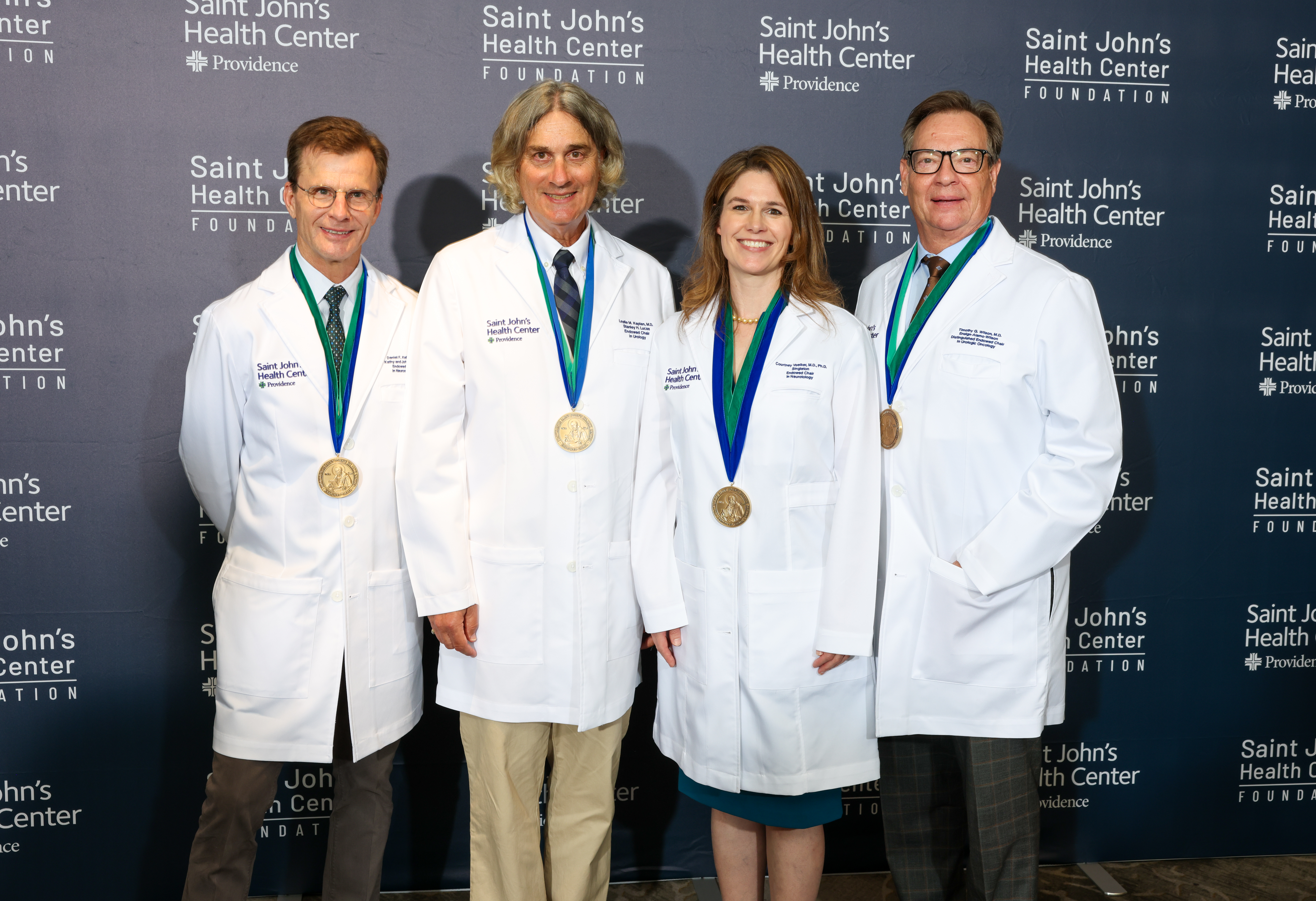 Providence Saint John’s Health Center honored four distinguished physicians during its second annual endowed chair investiture ceremony, held Sept. 3 at the Brentwood Country Club in Brentwood, Calif.  From left to right: Daniel F. Kelly, MD,Kathy and John Danhakl Endowed Chair in Neurosurgery; Leslie M. Kaplan, MD,Stanley H. Lucas Endowed Chair in Urology; Courtney C.J. Voelker, MD, PhDSingleton Endowed Chair in Neurotology; and Timothy G. Wilson, MDEnsign-Alamo-Wilson Distinguished Endowed Chair in Urologic Oncology.