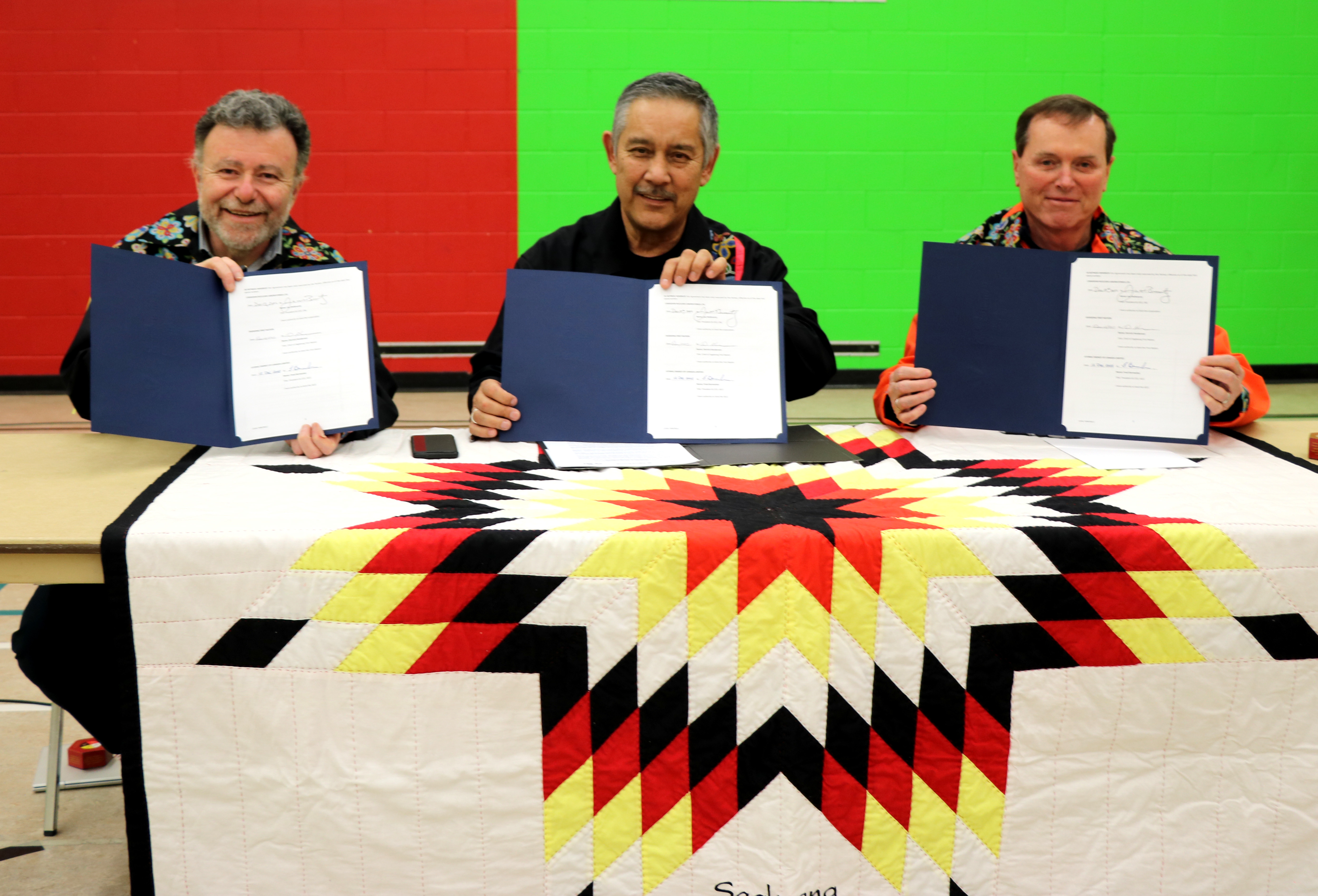 Fred Dermarkar, AECL President and CEO; Chief Derrick Henderson, Sagkeeng Anicinabe First Nation; and Joe McBrearty, CNL President and CEO, celebrate the launch of ‘Nigan Aki,’ an independent Sagkeeng environmental monitoring program that will be implemented at the Whiteshell Laboratories site