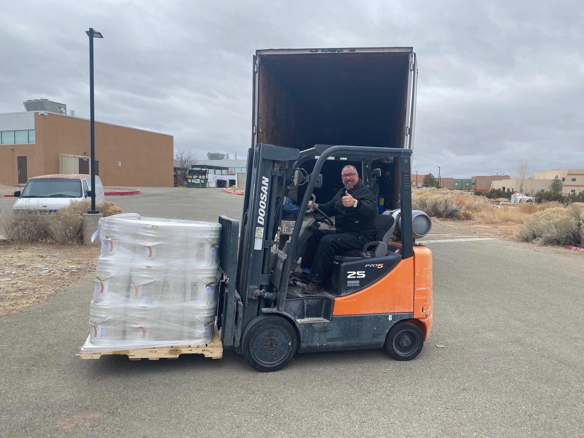 Peter Romero, Director of Facilities and Security at the Institute of American Indian Arts in Santa Fe, New Mexico, readies the college’s newly delivered supply.
 
