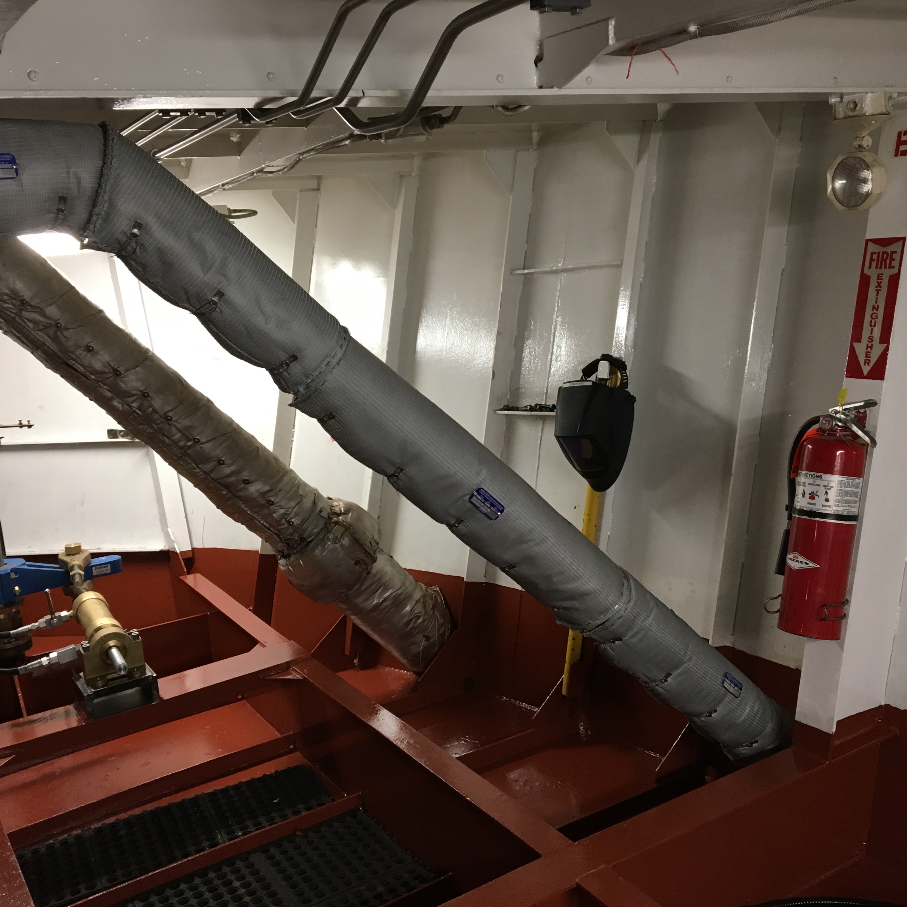 Maid of the Mist VII Engine Room with covered 3-inch exhaust line (foreground) exiting boat's stern.