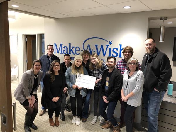 SAE Institute Nashville Entertainment Business Students present their first check to Make-A-Wish Middle Tennessee. The students have a goal to raise $31,000 for the foundation by December 2020. 