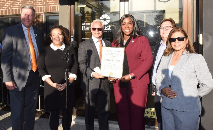 From left: Michael Gilfeather, President and CEO, Orange Bank & Trust Company; New York State Senator Nathalia Fernandez;  Anthony Mormile, Senior Vice President and Bronx Market Manager, Orange Bank & Trust Company; Bronx Borough President Vanessa Gibson; Jonathan Rouis, Chairman Orange Bank & Trust; and Olga Tirado, Orange Bank & Trust Company Board Member.