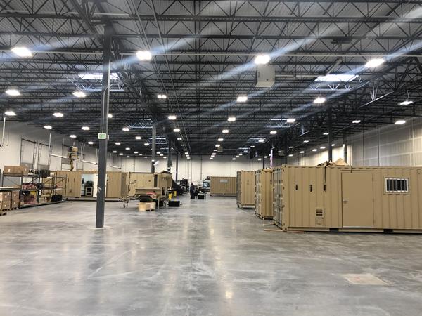 Pictured: Liteye Systems New 55K Sq. Ft. Manufacturing Facility, Highfield Business Park, Centennial Colorado – Several Containerized AUDS (C-AUDS) being assembled

